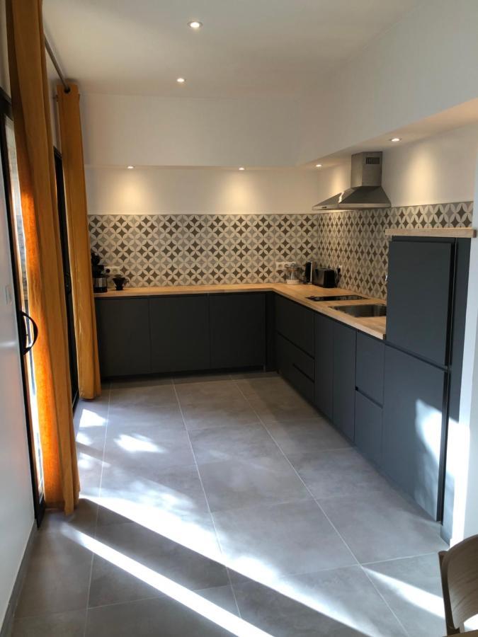 Bel appartement avec piscine chauffée Pezens Esterno foto