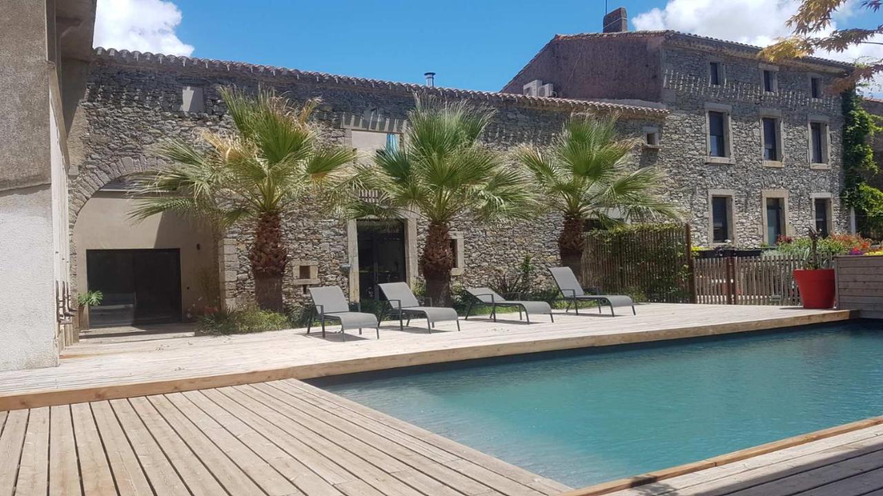 Bel appartement avec piscine chauffée Pezens Esterno foto