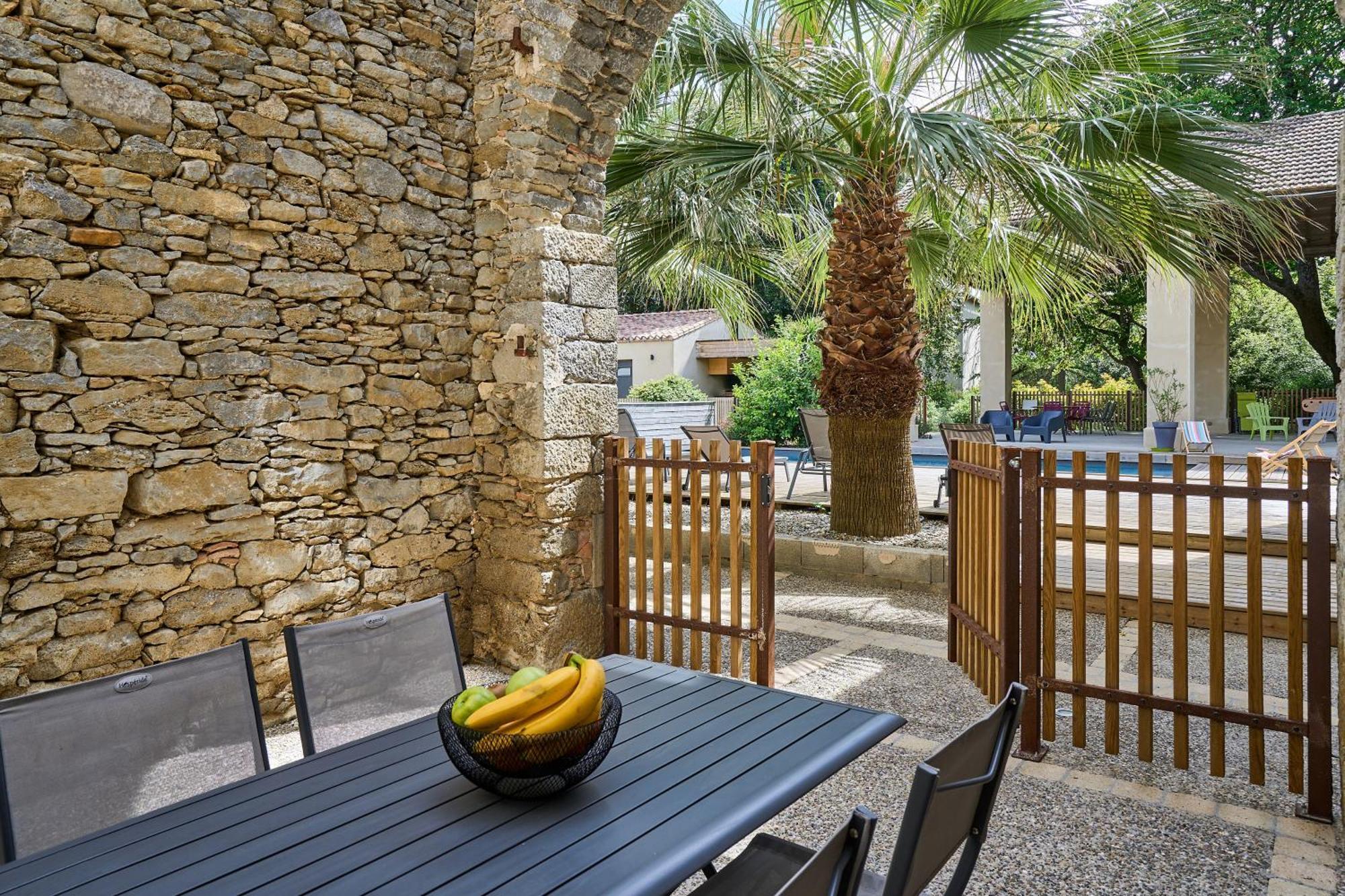 Bel appartement avec piscine chauffée Pezens Esterno foto